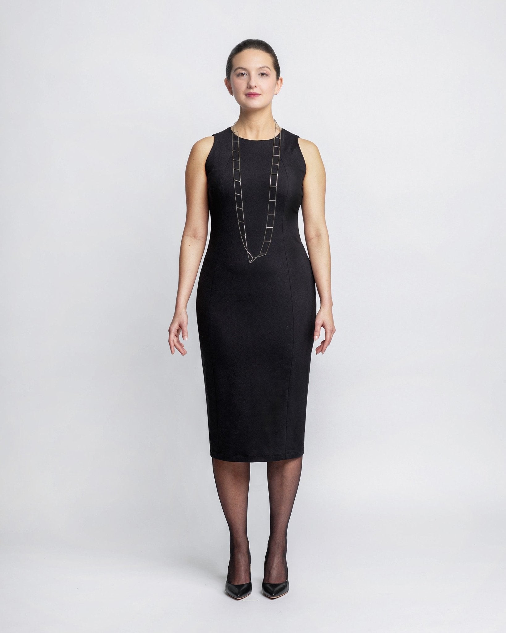 black dress silver necklace Black Dress Jewelry Pairings and How To Wear Them